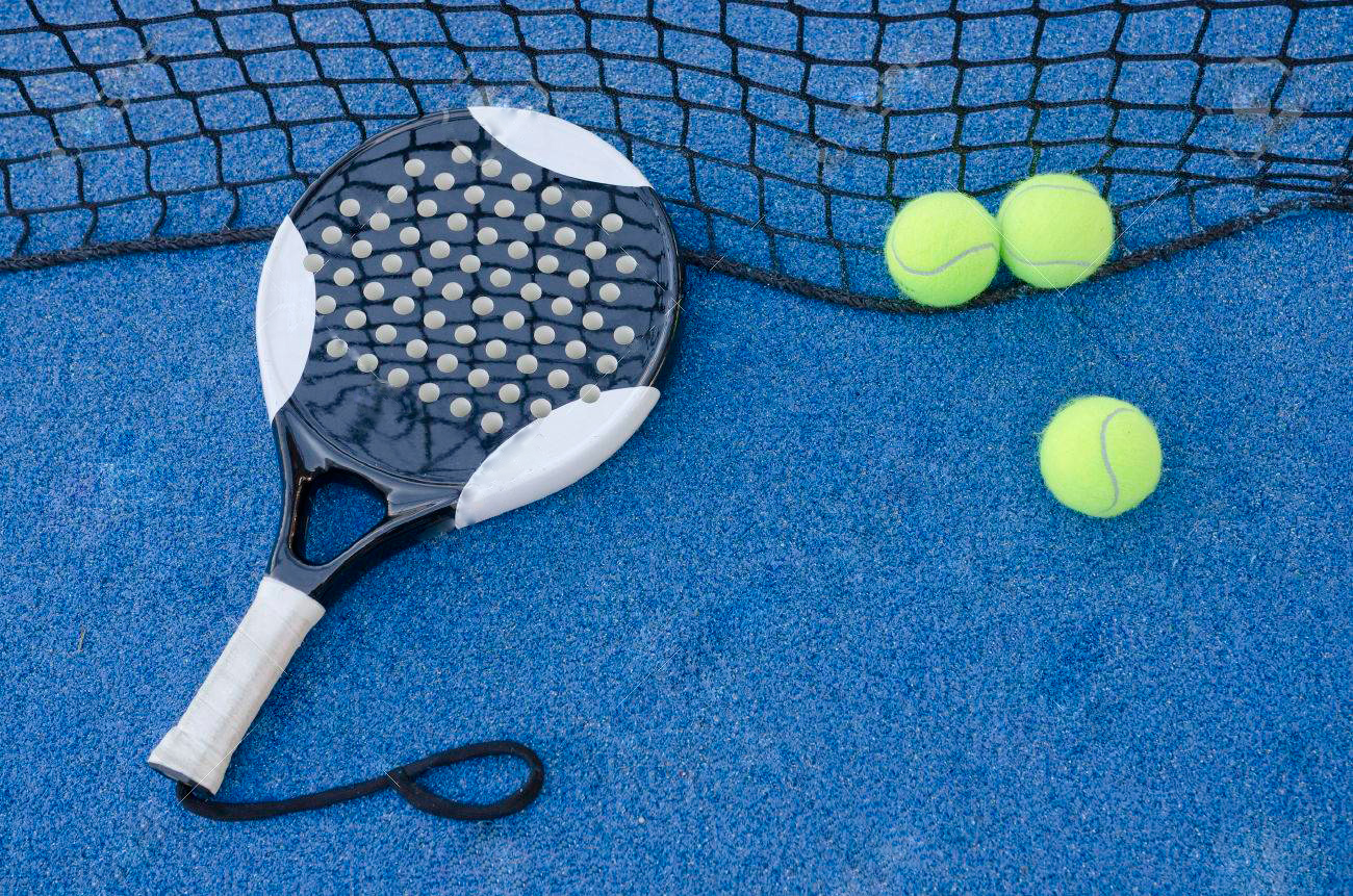 25304570-paddle-tennis-objects-on-artificial-turf-ready-for-tournament-edited